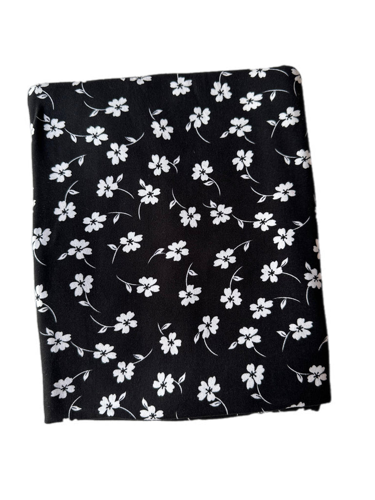 Black and white floral brushed poly knit