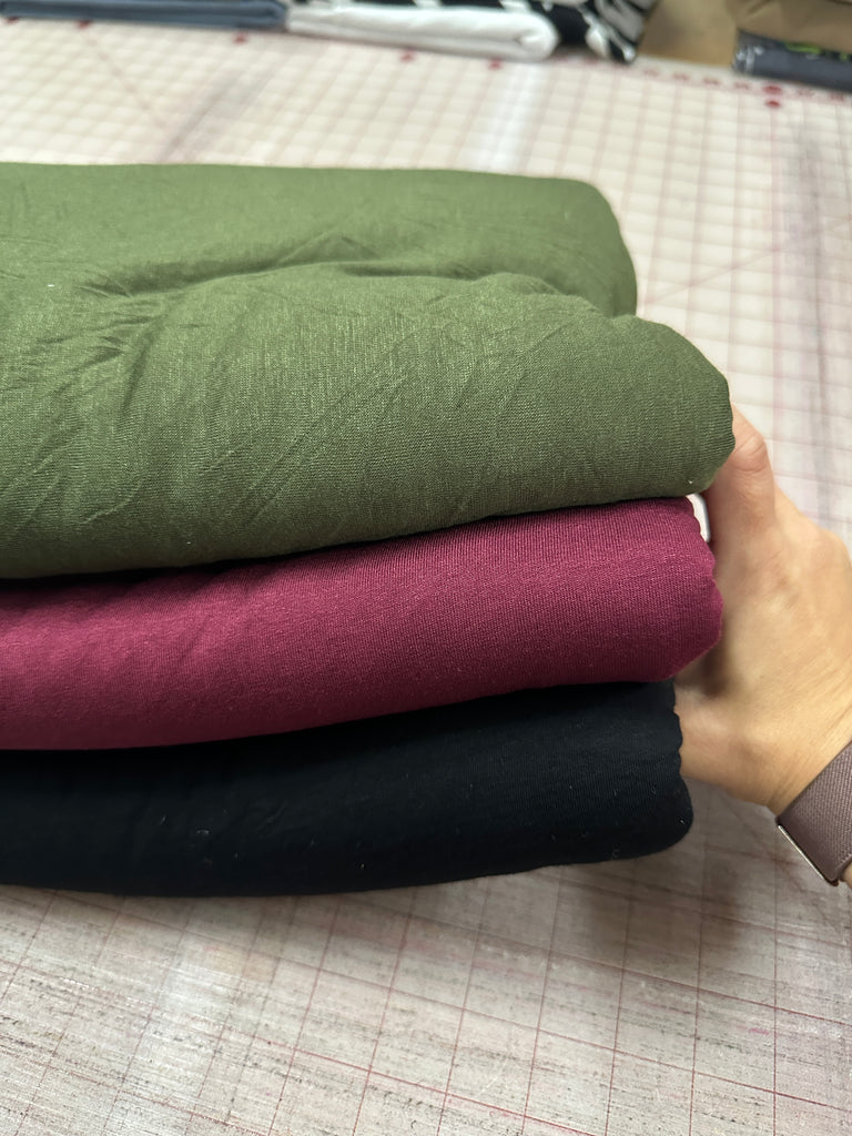 Rayon spandex knit bundle 14 yards total (test hole in middle of Olive)