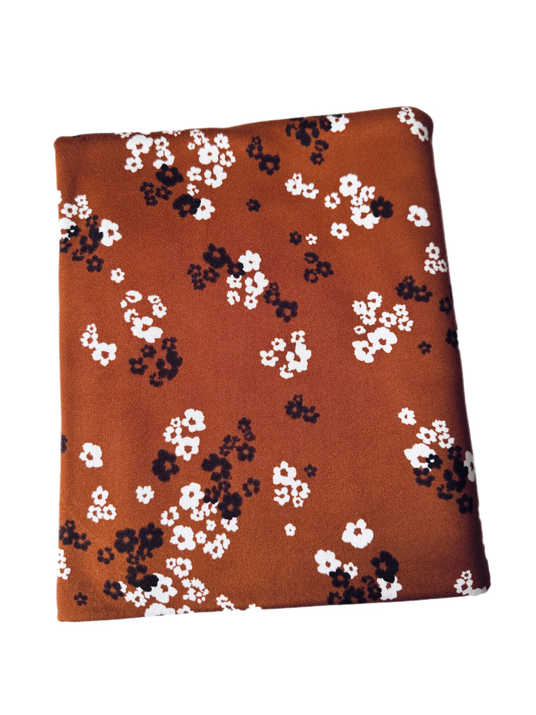 Rust and black floral brushed poly knit