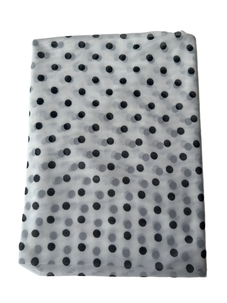 White and black polka dot mesh knit