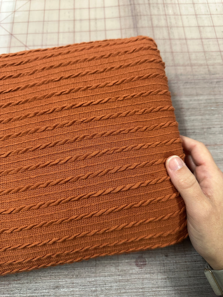 Rust cable sweater knit