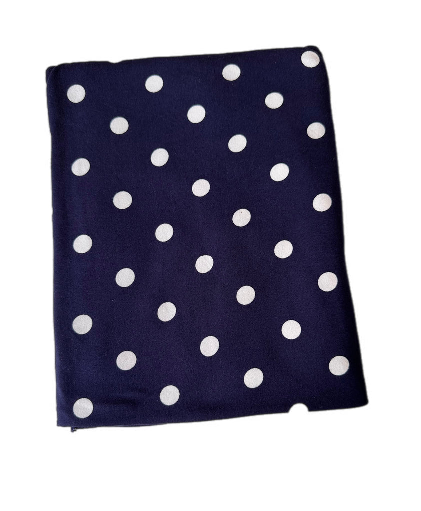 Navy and white polka dot brushed poly knit
