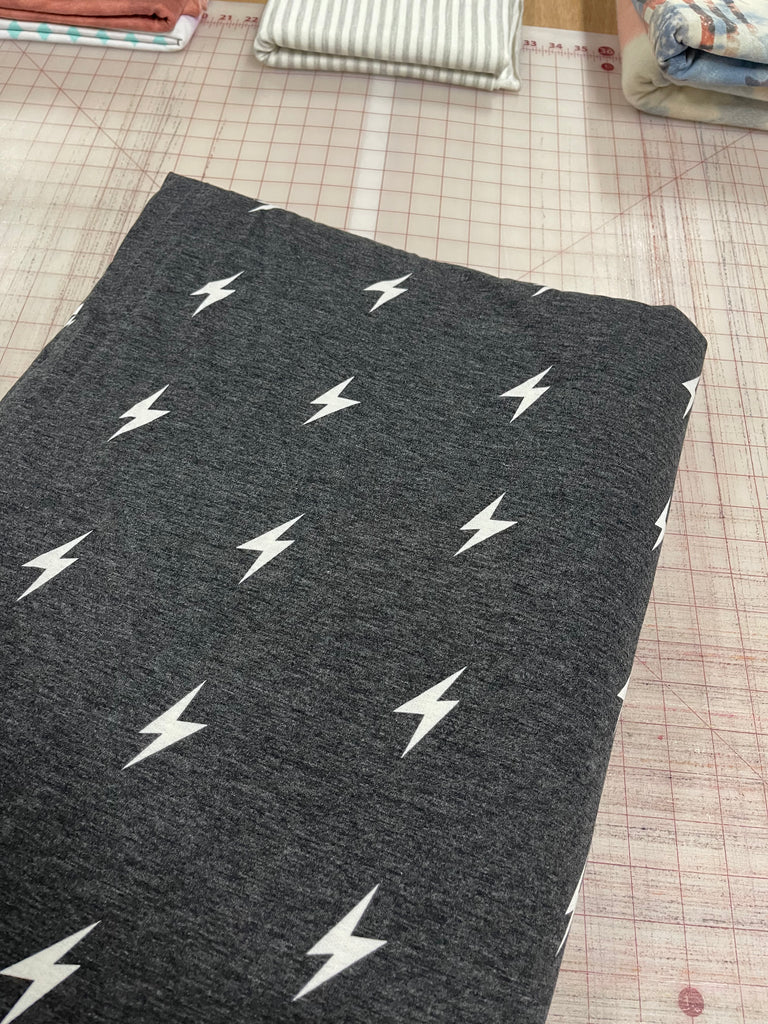 Charcoal and white bolts French terry knit